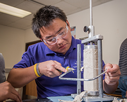 Grad student working with concrete